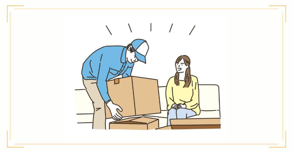 引越し作業を見守る女性